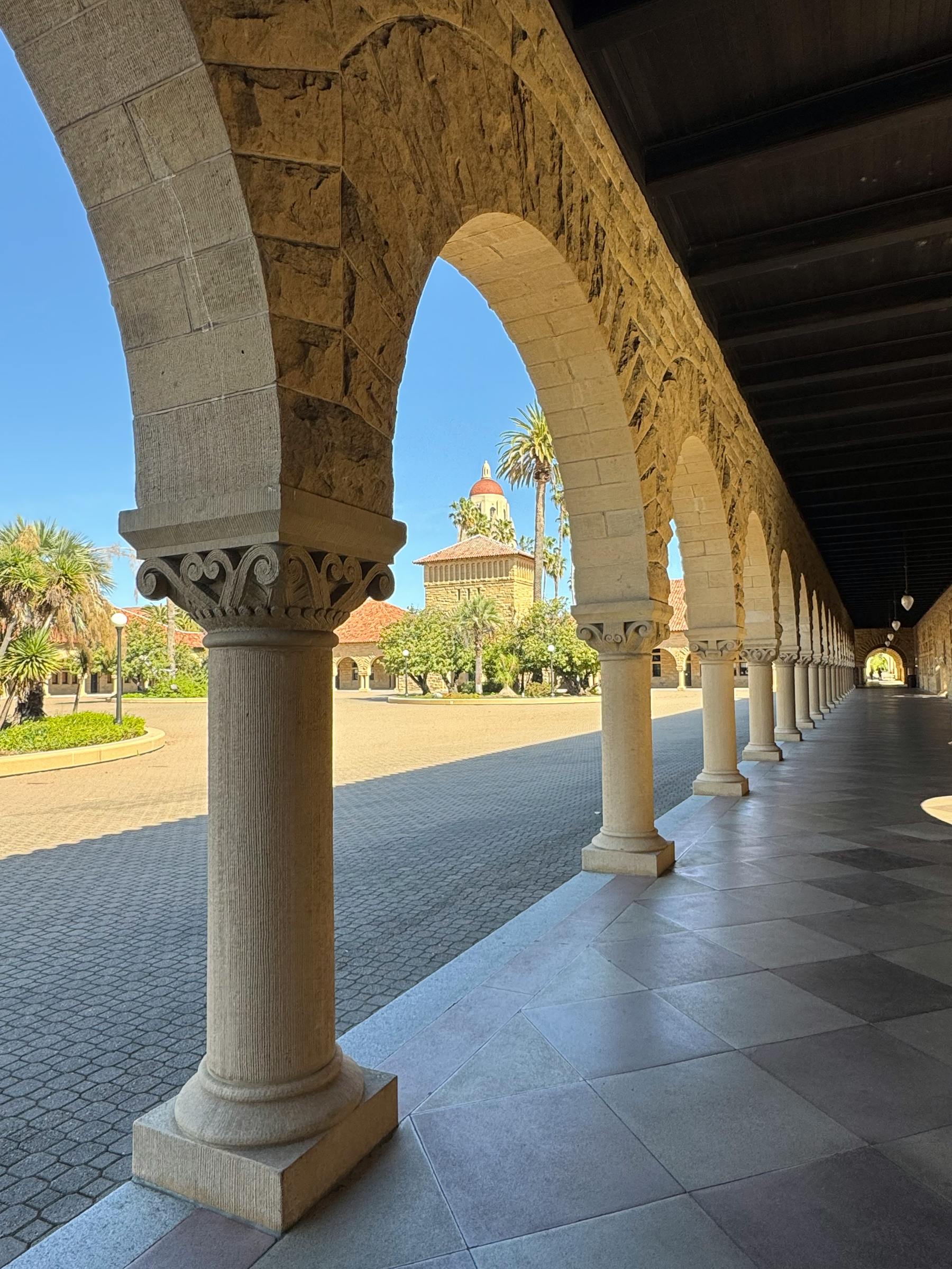 Peninsula campus arcade and palm trees near Palo Alto
