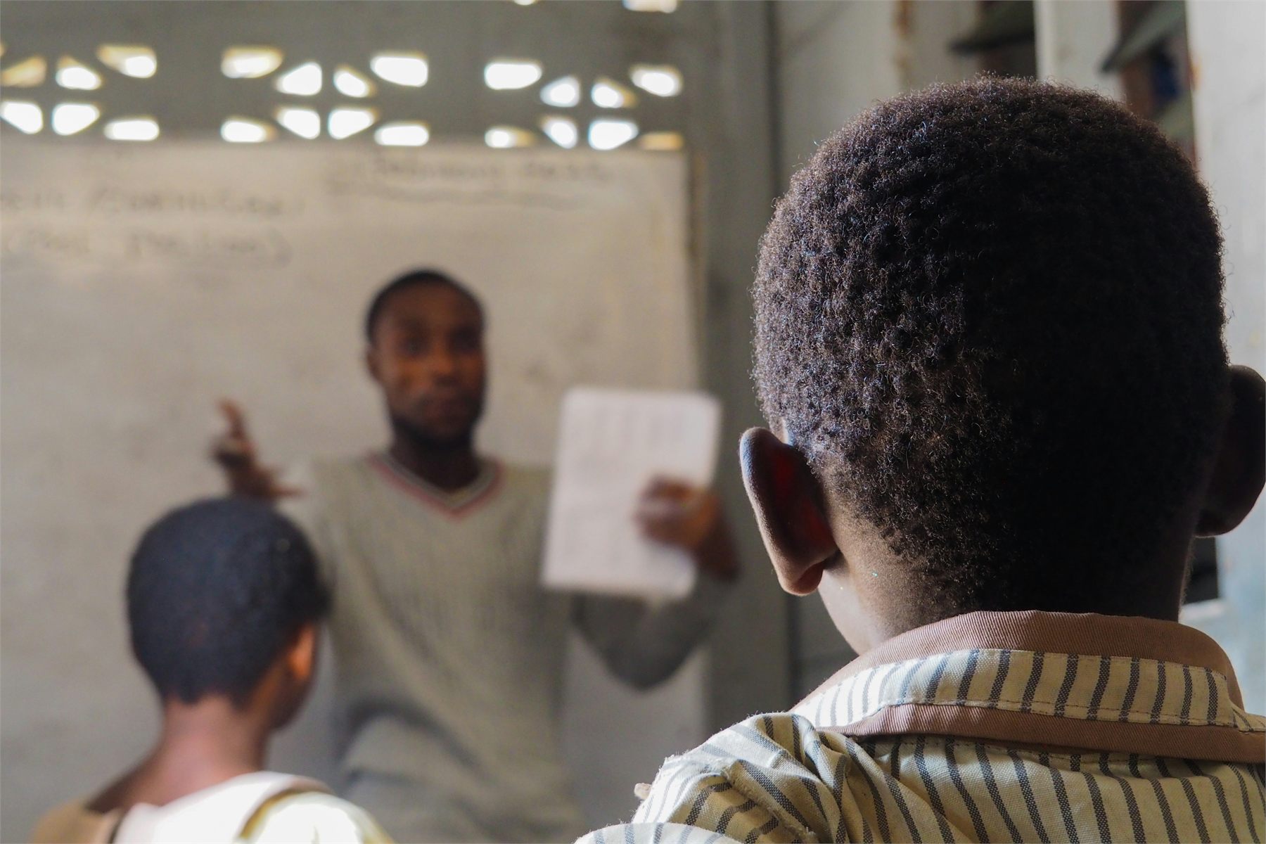 Teacher leading a classroom of students