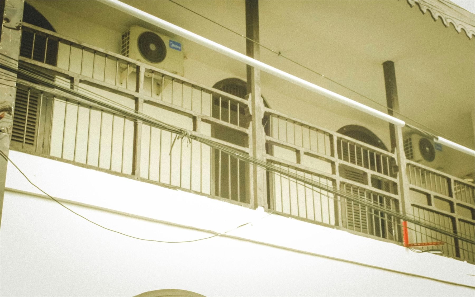 Building maintenance detail with exterior air conditioning equipment
